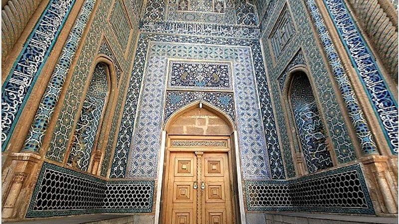 jame mosque with amazing entrance and wooden gate in kerman